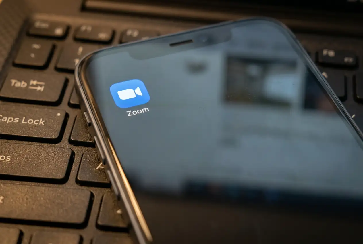 Zoom's first quarter revenue and EPS beat estimates, prompting a raised full-year fiscal 2027 outlook.